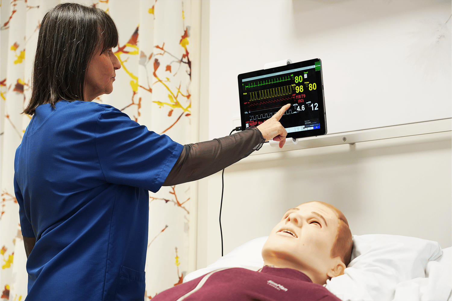 Simman-hoitosimulaatio